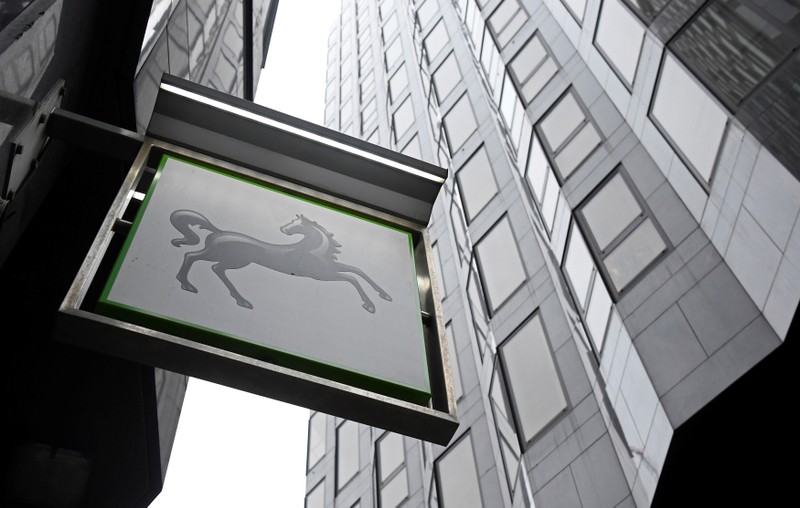 FILE PHOTO: A sign hangs outside a Lloyds Bank branch in London