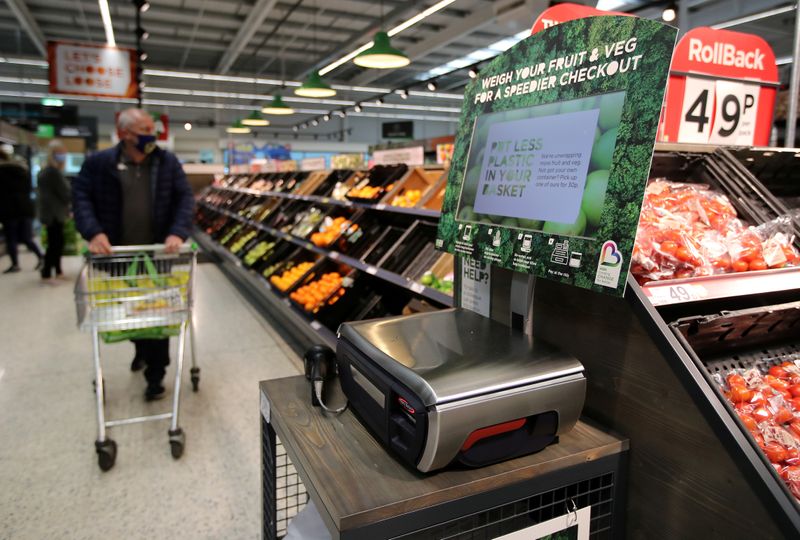 FILE PHOTO: Scales to weigh loose fresh produce are seen in the UK supermarket Asda in Leeds