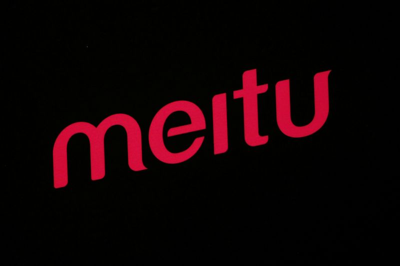 A logo of Meitu is displayed at a news conference in Hong Kong