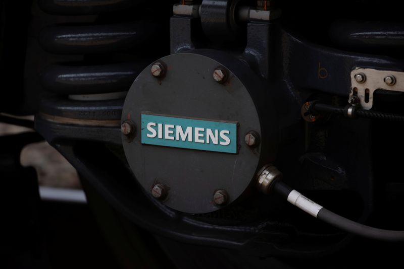  Siemens logo is shown on a new Siemens Charger locomotive in California
