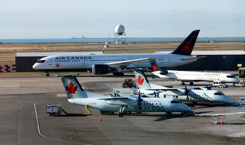FILE PHOTO: Air Canada airplanes are pictured at Vancouver's international airport in Richmond,