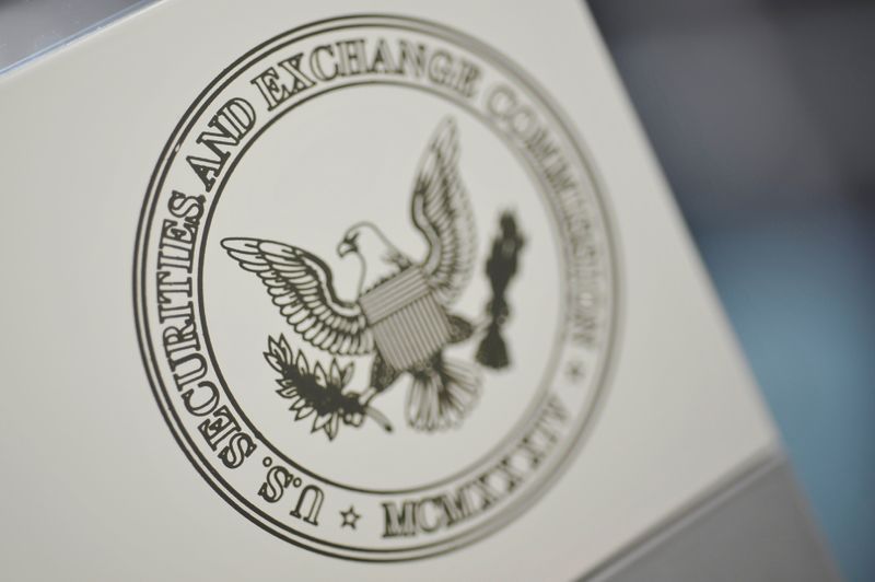FILE PHOTO: FILE PHOTO: FILE PHOTO: The U.S. Securities and Exchange Commission logo adorns an office door