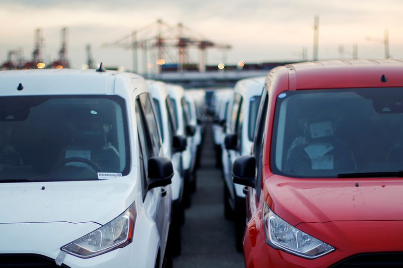 FILE PHOTO: Imported automobiles are parked in a lot at the port of Newark New Jersey