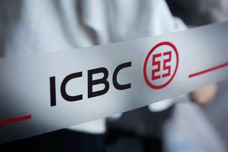 FILE PHOTO: The logo of Industrial and Commercial Bank of China (ICBC) is pictured at the entrance to its branch in Beijing