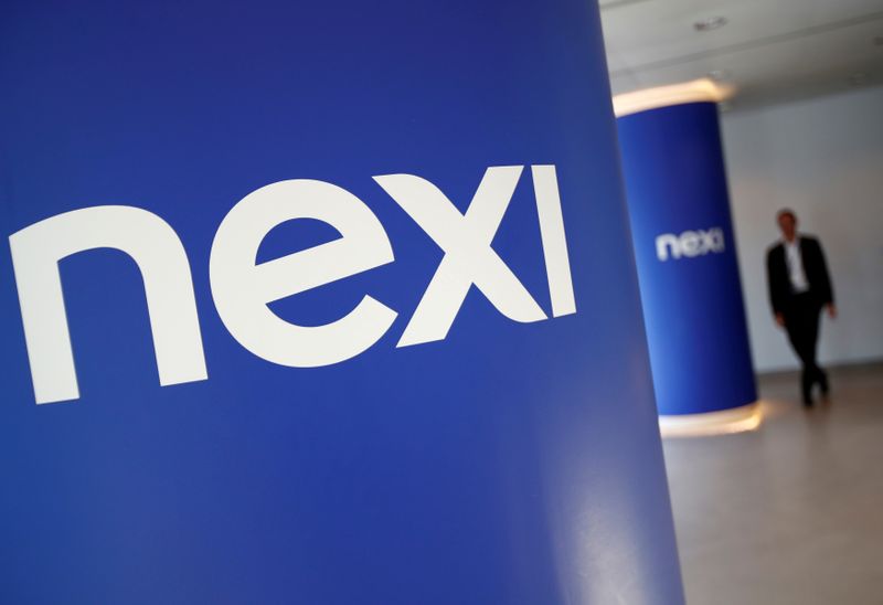 Il logo della società di pagamenti Nexi presso la sede centrale di Milano