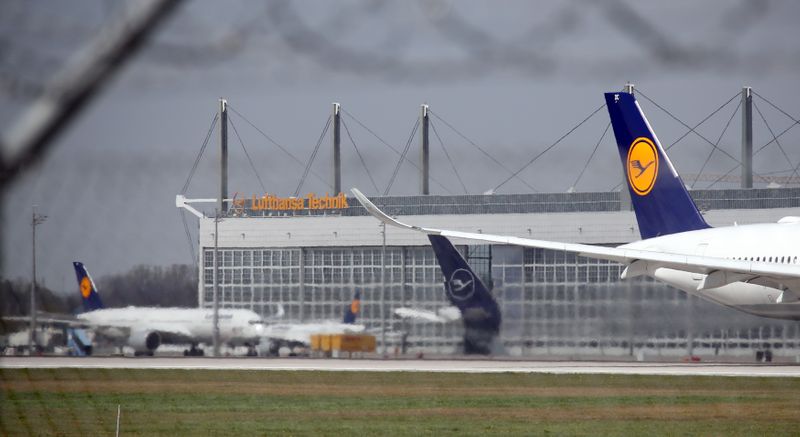 The tail of a Lufthansa airplane is seen outside a Lufthansa Technik maintenance hangar at Munich international airport
