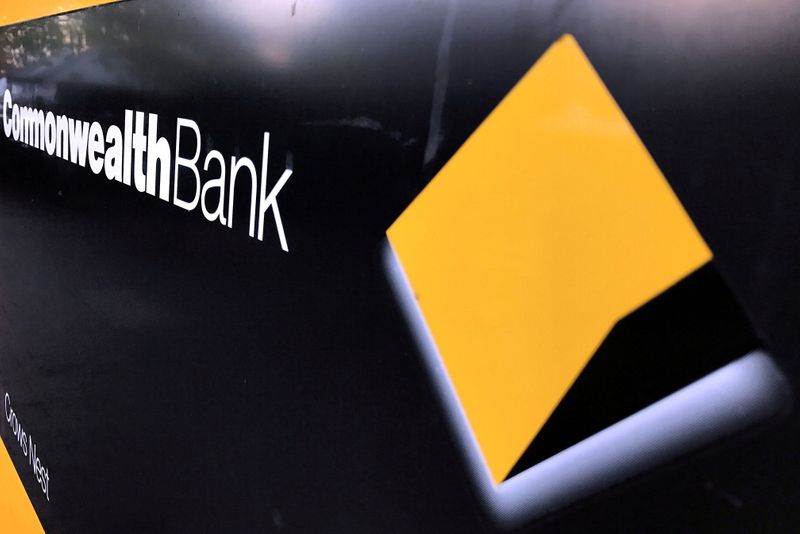 FILE PHOTO: A Commonwealth Bank of Australia logo adorns the wall of a branch in Sydney, Australia