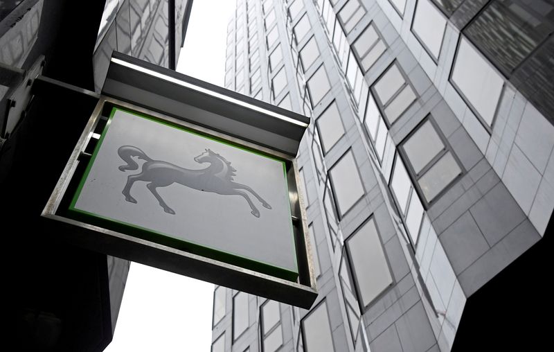 FILE PHOTO: A sign hangs outside a Lloyds Bank branch in London, Britain