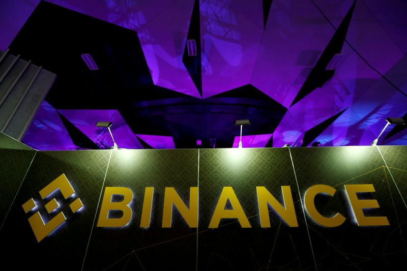 FILE PHOTO: The logo of Binance is seen on their exhibition stand at the Delta Summit, Malta's official Blockchain and Digital Innovation event promoting cryptocurrency, in St Julian's