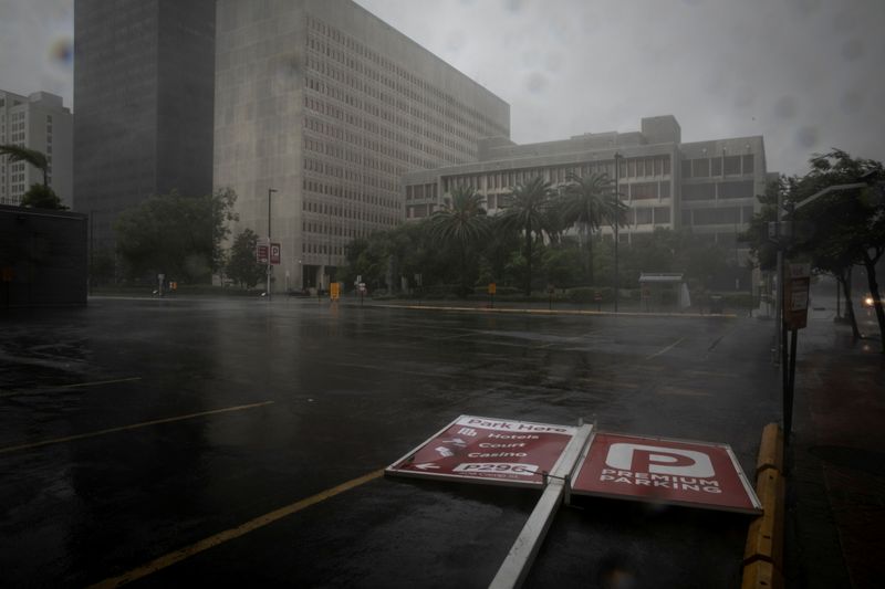FILE PHOTO: A parking sign lies in the street as Hurricane Ida makes landfall in Louisiana, in New Orleans