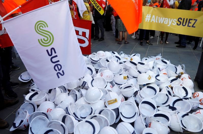 FILE PHOTO: Suez unions call employees to protest against Veolia takeover plan in La Defense