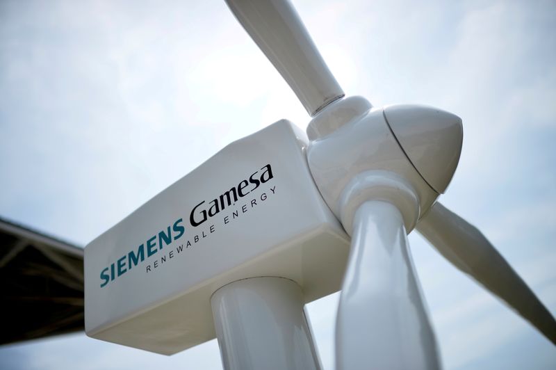 FILE PHOTO: A model of a wind turbine with the Siemens Gamesa logo is displayed in Zamudio, Spain