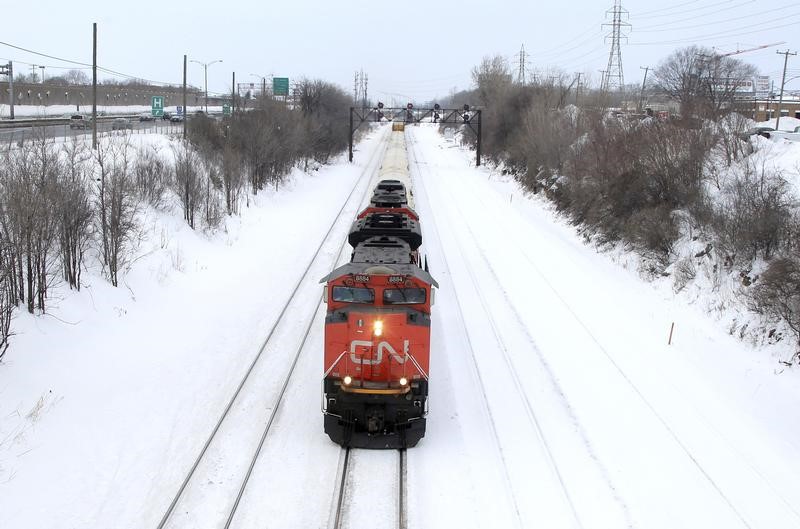 FILE PHOTO: A Canadian National Railway train travels eastward on a track in Montreal