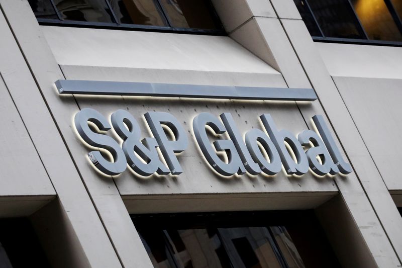 FILE PHOTO: The S&P Global logo is displayed on its offices in the financial district in New York