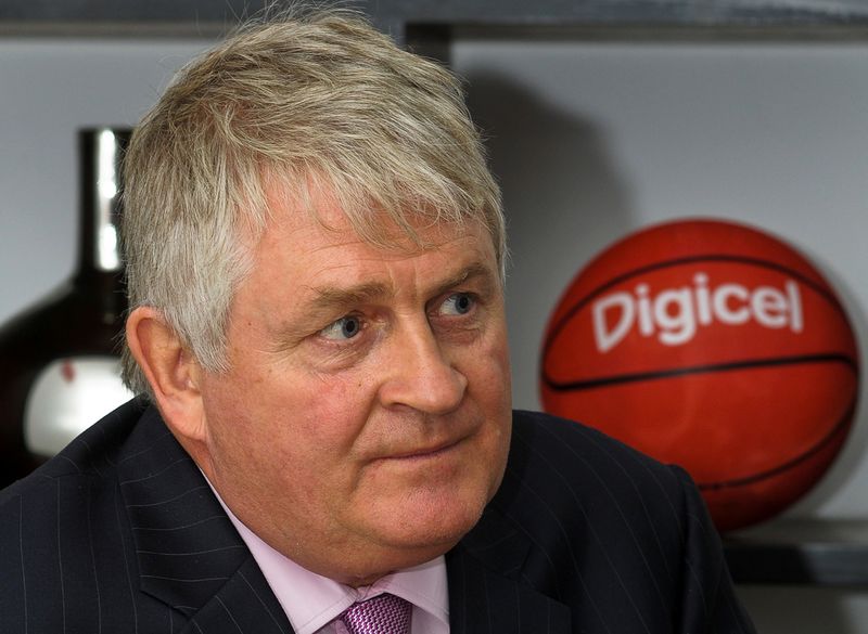 FILE PHOTO: Digicel Chairman Denis O'Brien attends an interview with Reuters at the company's headquarters in Port-au-Prince
