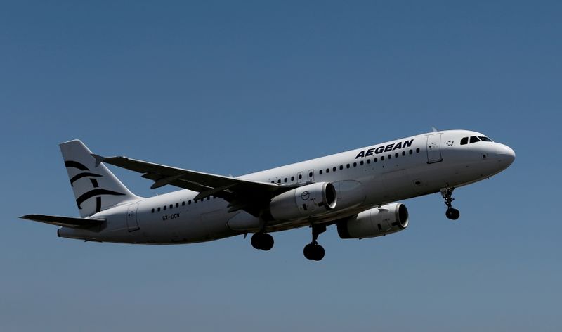 FILE PHOTO: An Aegean Airlines Airbus A320 aircraft takes off from the Eleftherios Venizelos International Airport in Athens