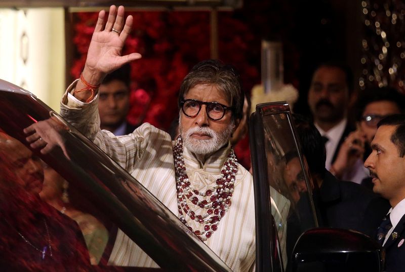 FILE PHOTO: Bollywood actor Amitabh Bachchan leaves after attending the wedding ceremony of Isha Ambani in Mumbai