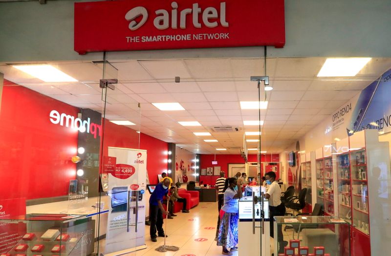 FILE PHOTO: A general view shows customers and employees inside a mobile phone service centre operated by Kenyan telecom operator Airtel Kenya at the Sarit Centre within the Westlands district of Nairobi