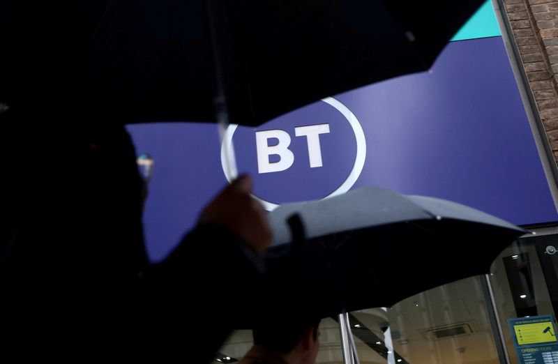 FILE PHOTO: Logo of British Telecom (BT) is displayed outside a store in London