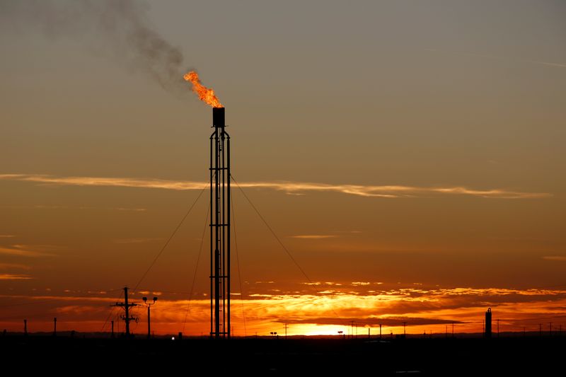 FILE PHOTO: A flare burns excess natural gas in the Permian Basin in Loving County, Texas
