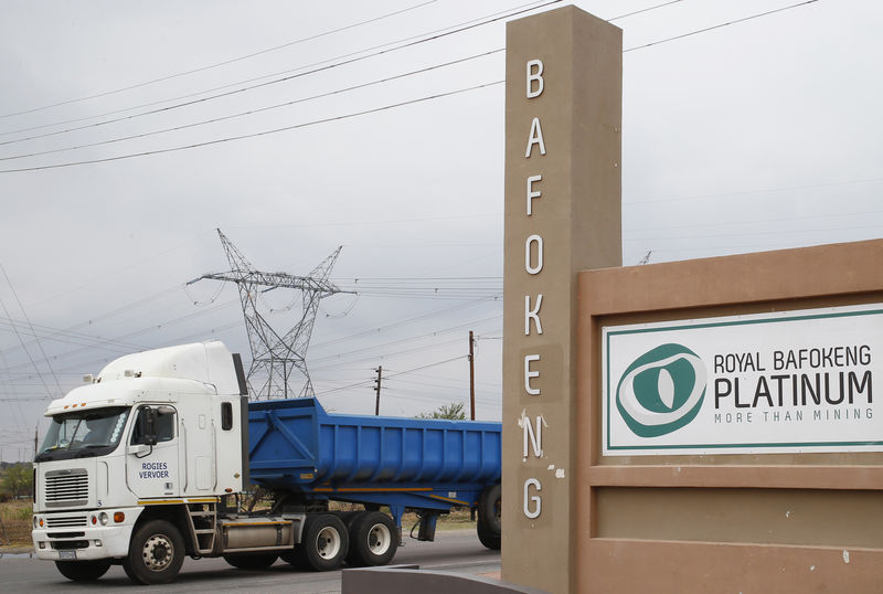 A truck drives past the entrance to the Royal Bafokeng Platinum Rasimone mine near Phokeng in the North West province