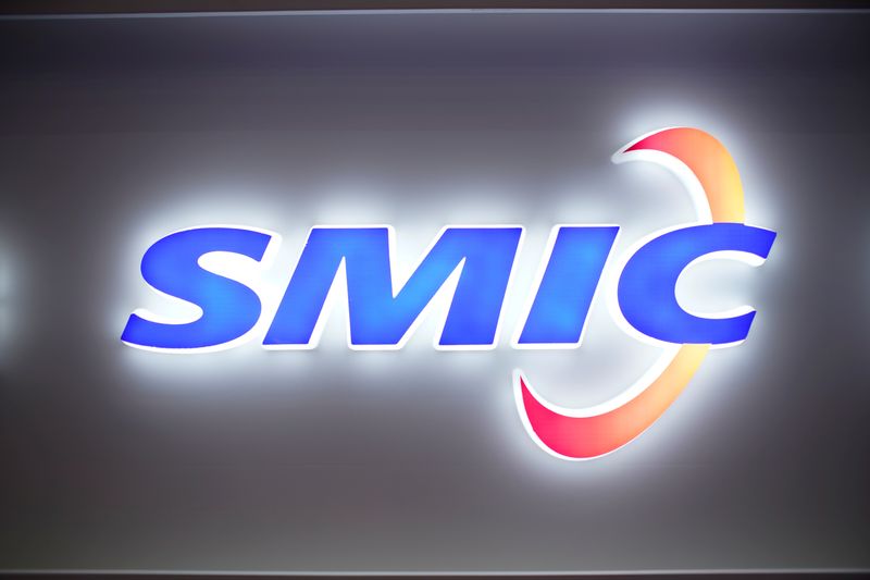 FILE PHOTO: A logo of Semiconductor Manufacturing International Corporation (SMIC) is seen at China International Semiconductor Expo (IC China 2020) following the coronavirus disease (COVID-19) outbreak in Shanghai