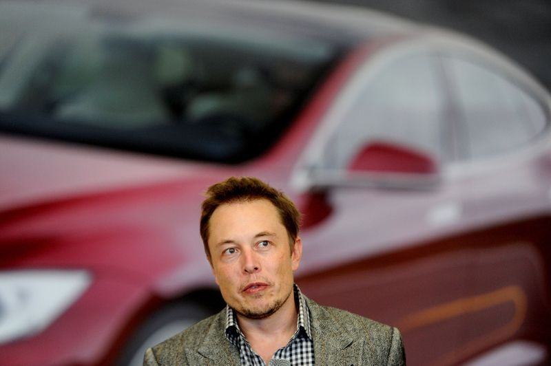 FILE PHOTO: Tesla Chief Executive Office Elon Musk speaks at his company's factory in Fremont