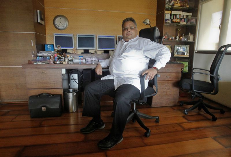 FILE PHOTO: Investor Rakesh Jhunjhunwala poses for a picture in his office in Mumbai