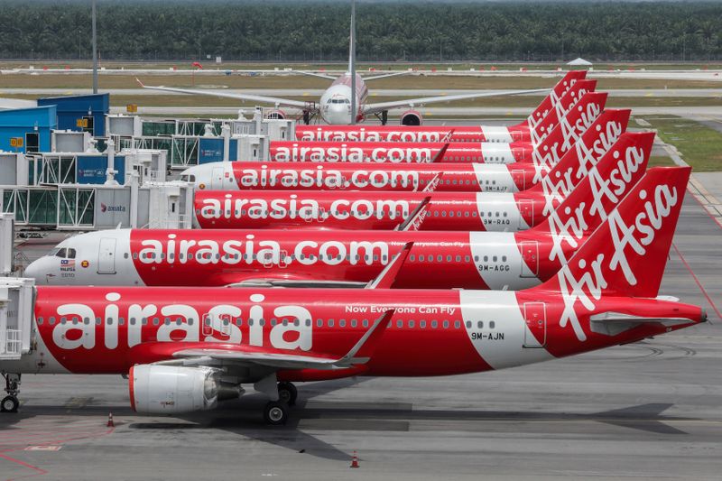 FILE PHOTO: AirAsia planes are seen parked at Kuala Lumpur International Airport 2, during the movement control order due to the outbreak of the coronavirus disease (COVID-19), in Sepang
