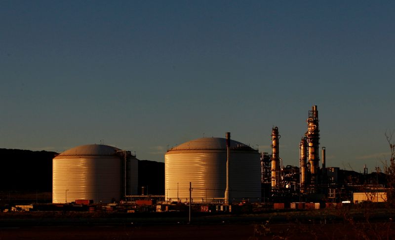 FILE PHOTO: The Woodside gas plant is seen at sunset in Burrup at the Pilbara region in Western Australia