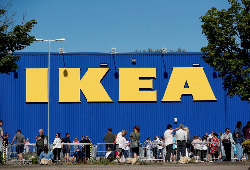 FILE PHOTO: People queue at Ikea as it re-opens, following the outbreak of the coronavirus disease (COVID-19), in Gateshead