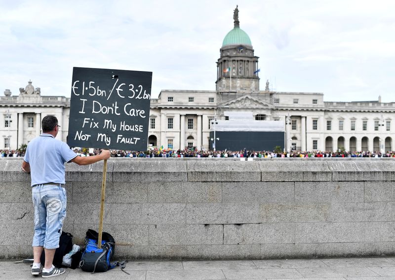FILE PHOTO: Protest demanding redress for usage of porous mica blocks in housing, in Dublin
