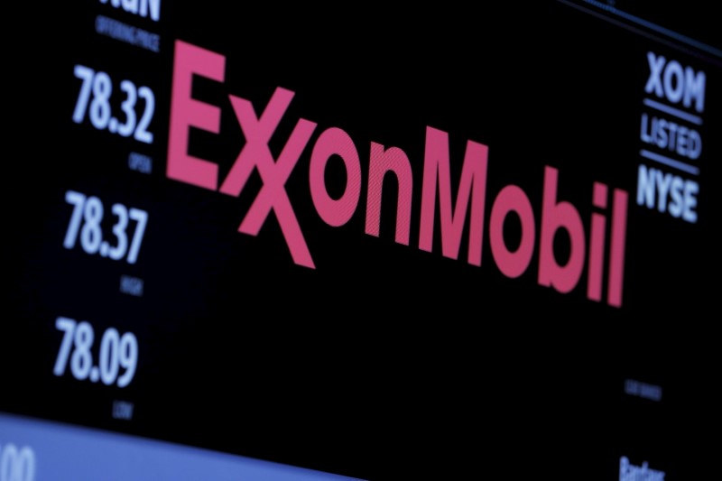 FILE PHOTO: The logo of Exxon Mobil Corporation is shown on a monitor above the floor of the New York Stock Exchange in New York