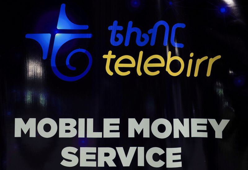 FILE PHOTO: A banner with the logo of Ethio-Telecom's Telebirr mobile money service is seen during its launch, in Addis Ababa