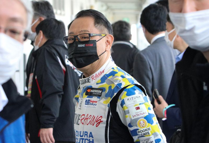 Toyota Motor Corporation President Akio Toyoda wearing a racing suit is seen after a press conference in Mimasaka, Japan