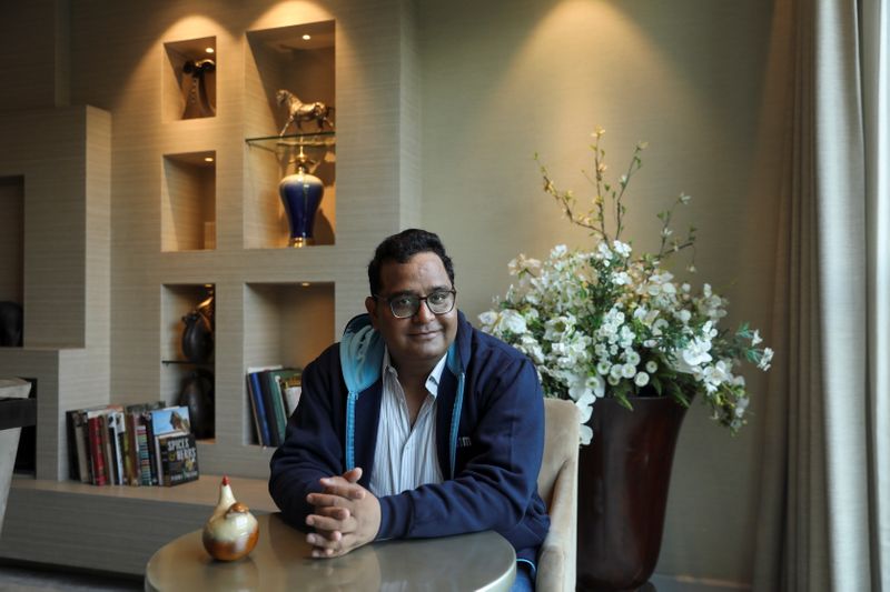 FILE PHOTO: Paytm founder and CEO Vijay Shekhar Sharma poses for a picture at a clubhouse of a residential building in New Delhi