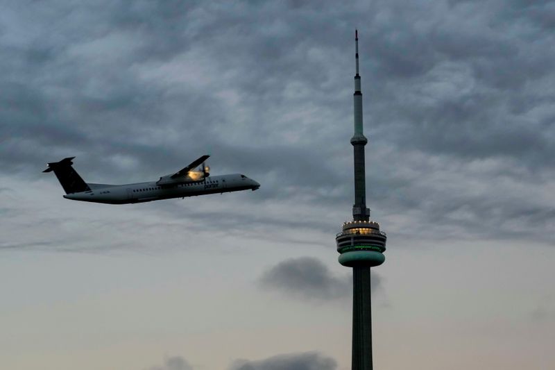 FILE PHOTO: An airplane takes off from Billy Bishop Airport in Toronto