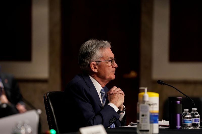 FILE PHOTO: Treasury Secretary Janet Yellen and Federal Reserve Chair Jerome Powell testify before a Senate Banking Committee hybrid hearing on oversight of the Treasury Department and the Federal Reserve on Capitol Hill in Washington