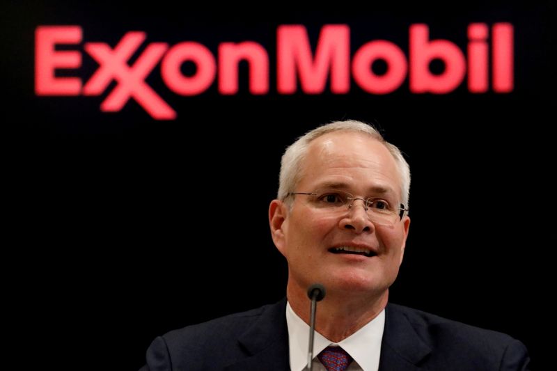 FILE PHOTO: Darren Woods, Chairman & CEO, Exxon Mobil Corporation speaks during a news conference at the NYSE