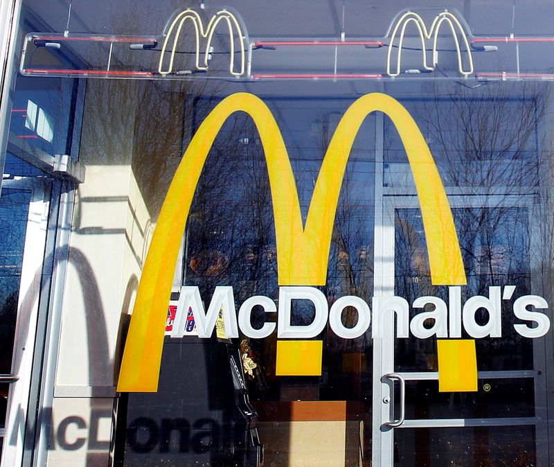 FILE PHOTO: McDonald's logo is seen on the window of one of its restaurants in New York