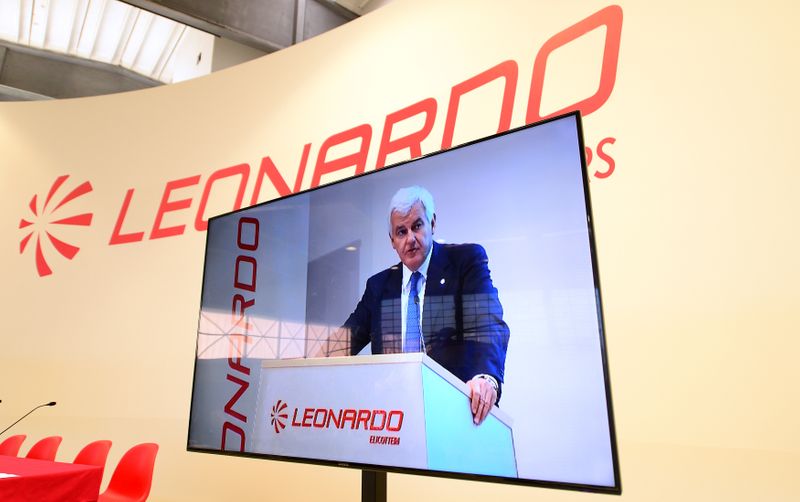 Leonardo's CEO Profumo is seen on a screen at the headquarters in Vergiate