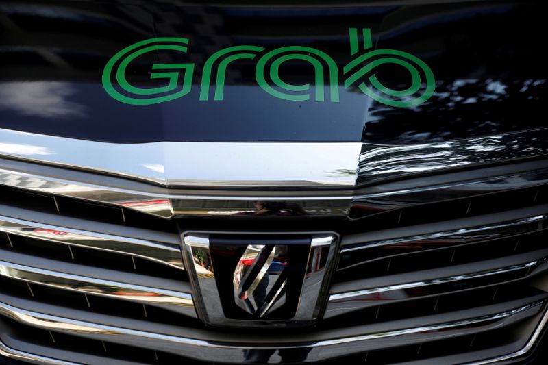 FILE PHOTO: A Grab vehicle is pictured in Singapore
