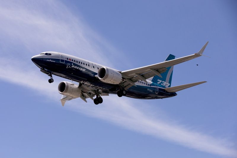 FILE PHOTO: A Boeing 737 MAX airplane lands after a test flight at Boeing Field in Seattle