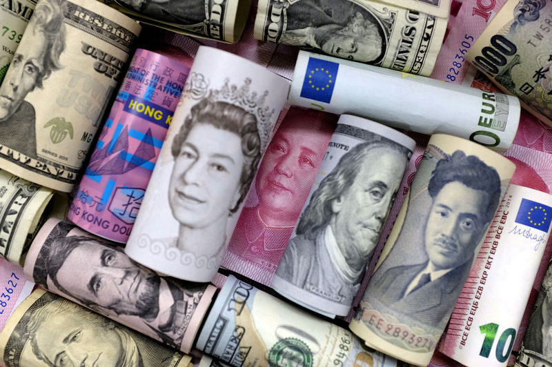 Euro, dollari di Hong Kong, dollari Usa, yen, sterline e yuan in un'illustrazione