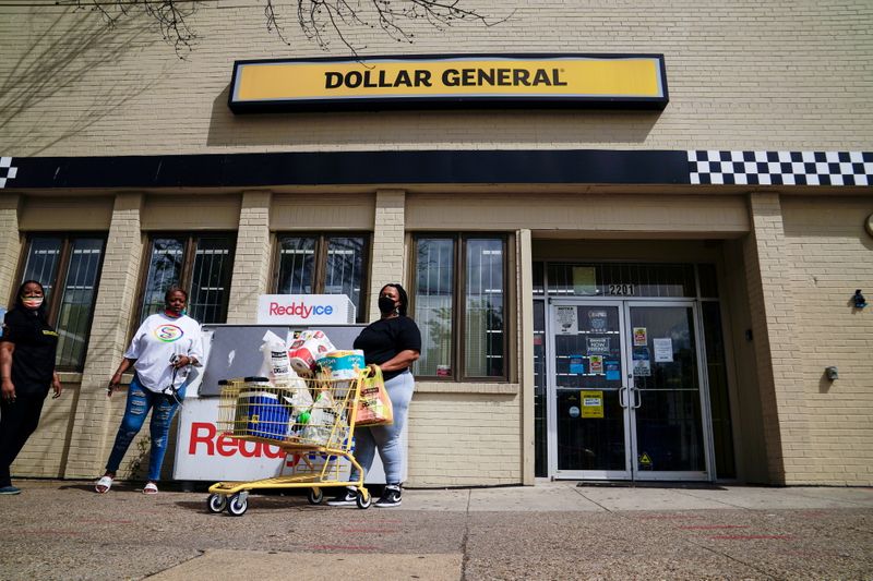 FILE PHOTO: A person exits a Dollar General store in Mount Rainier, Maryland