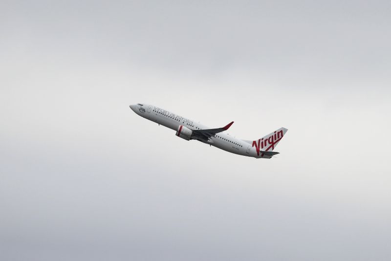 A Virgin Australia Airlines plane takes off from Sydney Airport in Sydney