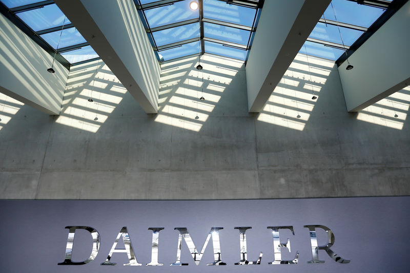 FILE PHOTO: The Daimler logo is seen before the carmaker's annual shareholder meeting in Berlin