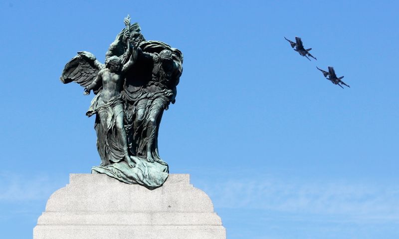FILE PHOTO: Fighter jets do a flyover during Remembrance Day ceremonies at the National War Memorial in Ottawa