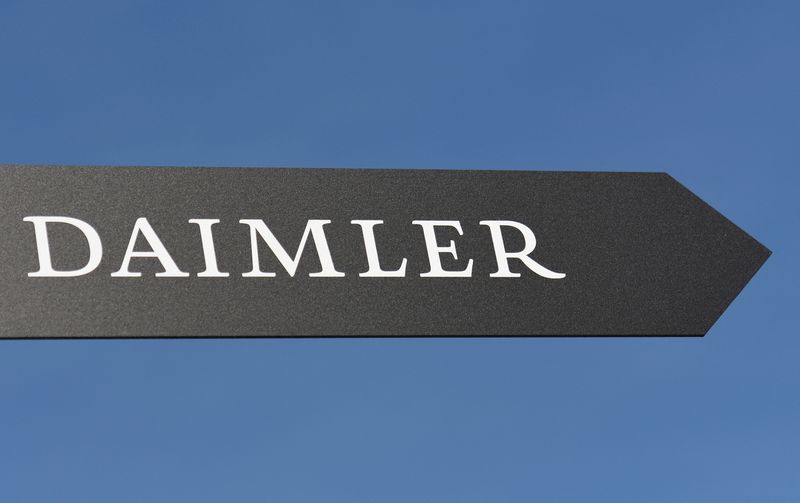 FILE PHOTO: Daimler AG sign is pictured at the IAA truck show in Hanover
