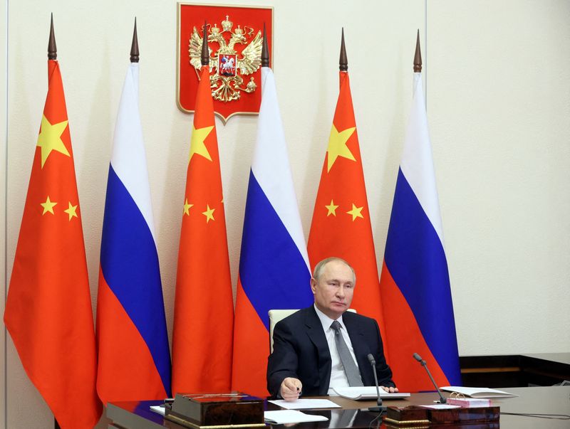 Russian President Vladimir Putin holds talks with Chinese President Xi Jinping outside Moscow